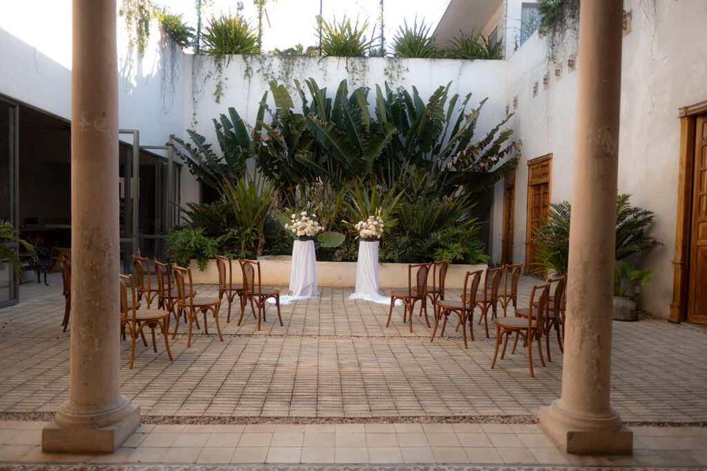 The courtyard set for the ceremony, framed by the colonnade